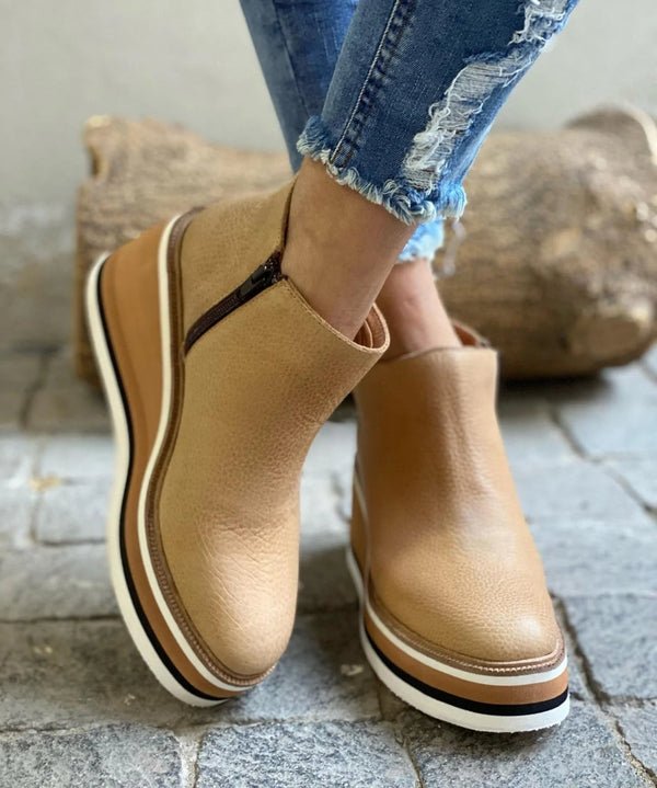 BOTTES ÉLÉGANTES ET IMPERMÉABLES